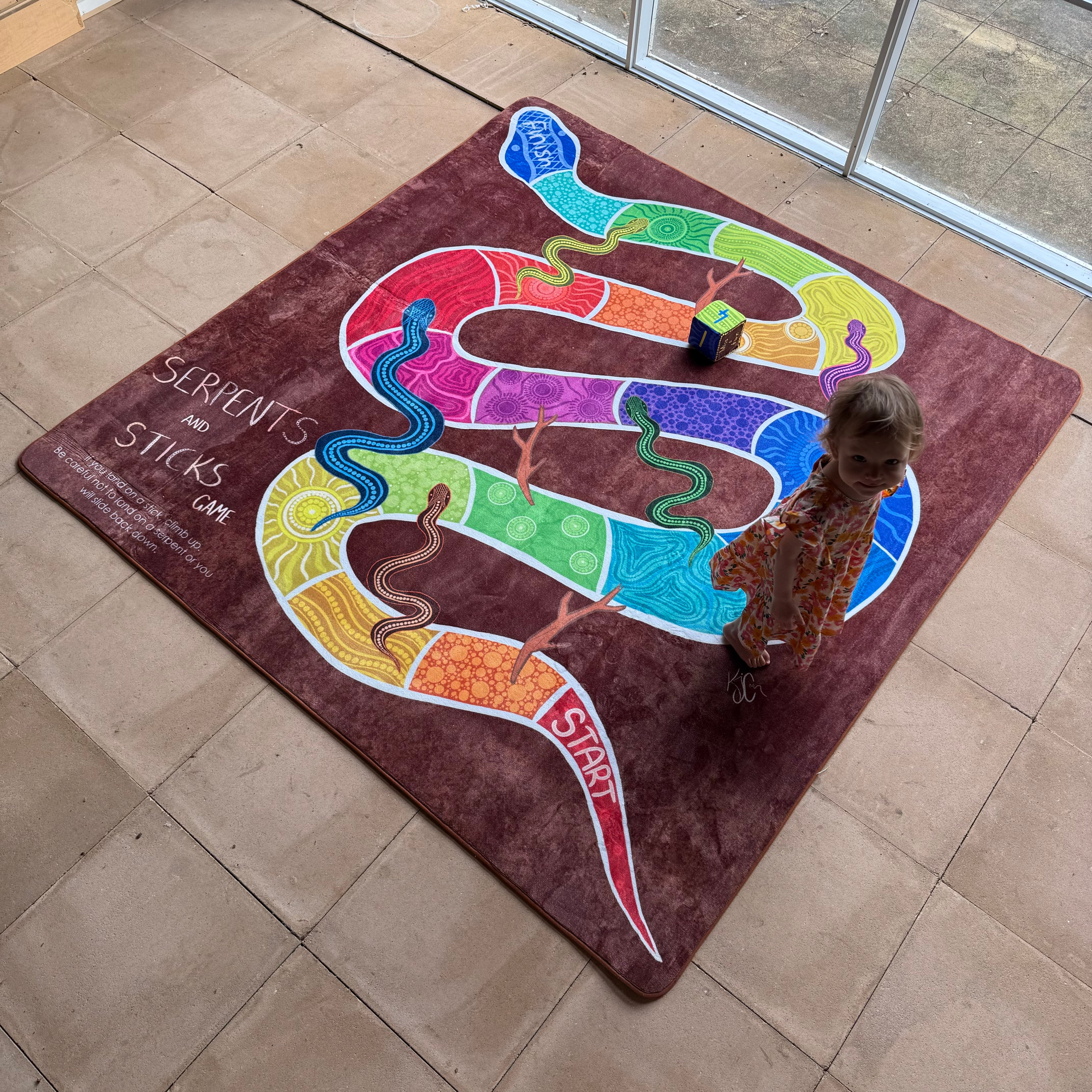 Serpents and Sticks Rug Game with soft Dice