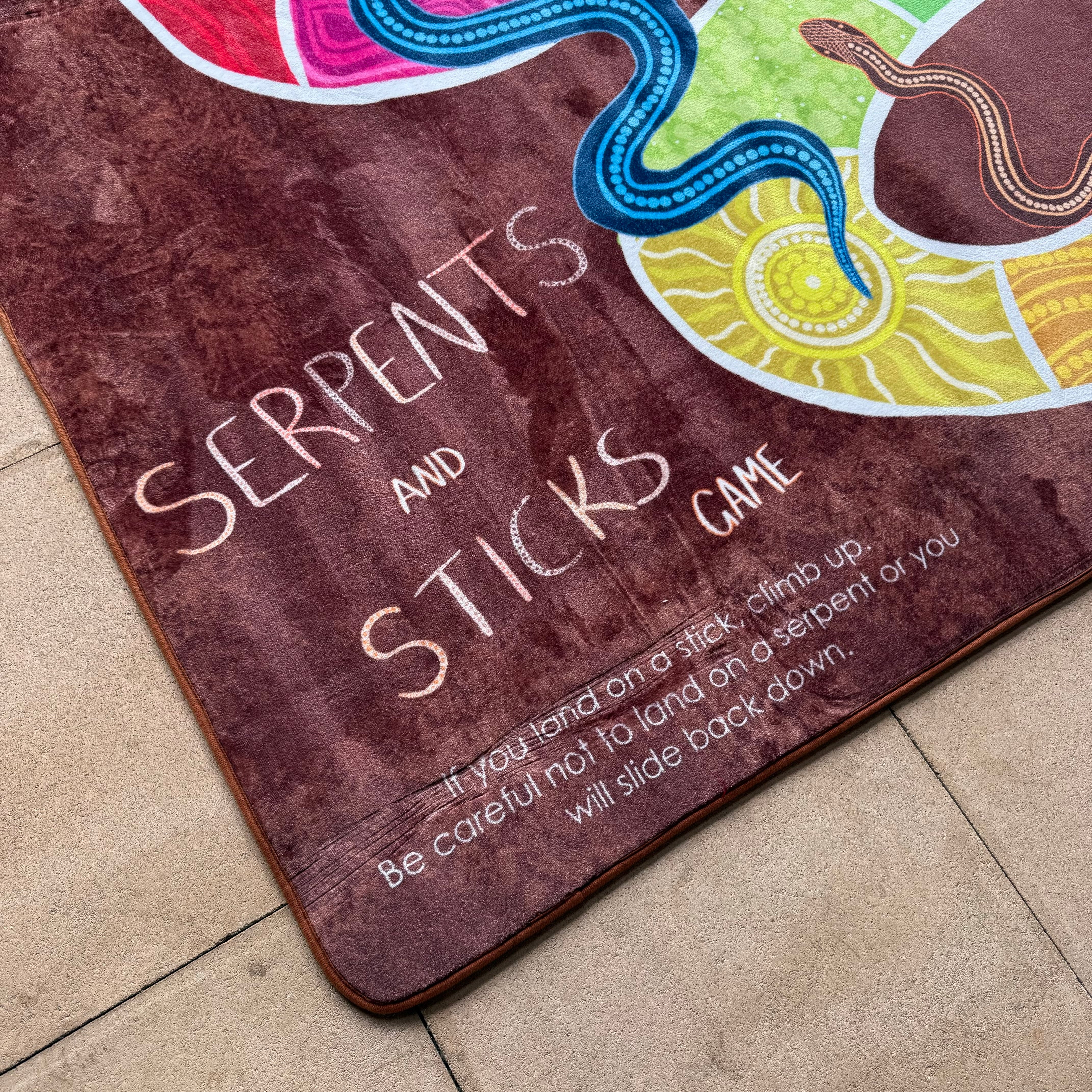 Serpents and Sticks Rug Game with soft Dice